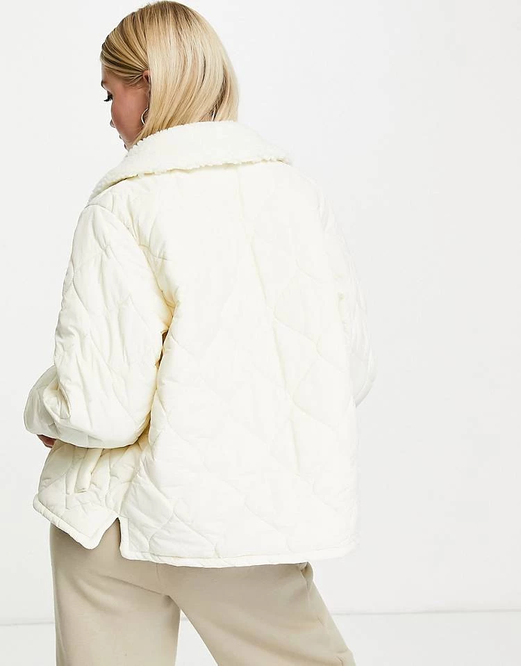 Urban Revivo Quilted Short Jacket With Borg Jacket In Off White For Women 4 Urban Revivo Quilted Short Jacket With Borg Jacket In Off White For Women - Image 2