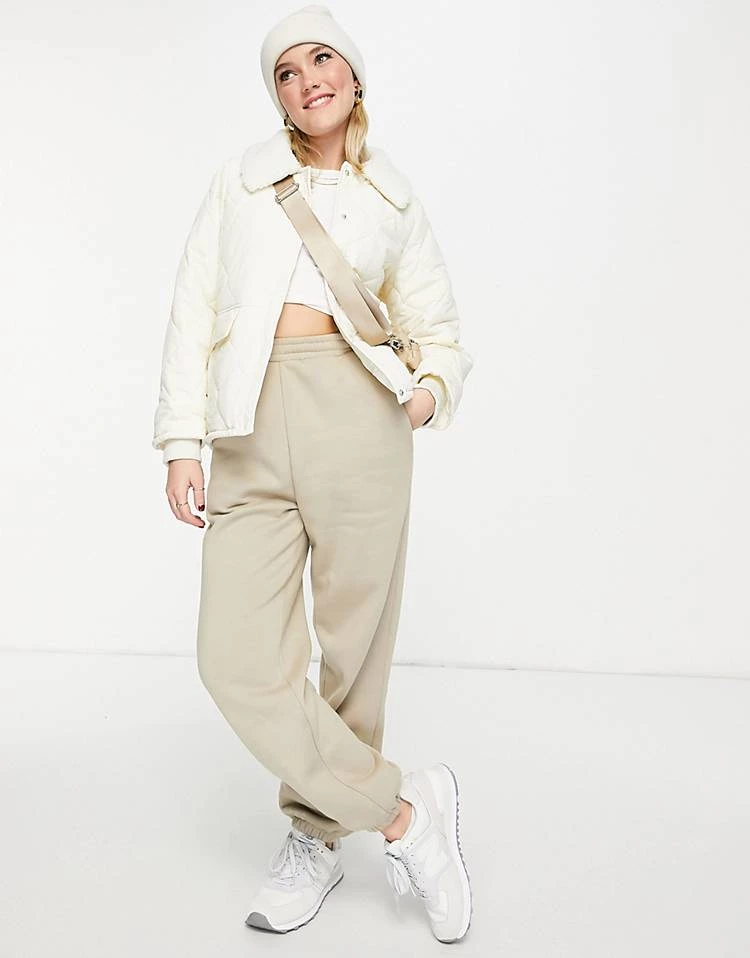 Urban Revivo Quilted Short Jacket With Borg Jacket In Off White For Women 6 Urban Revivo Quilted Short Jacket With Borg Jacket In Off White For Women - Image 4