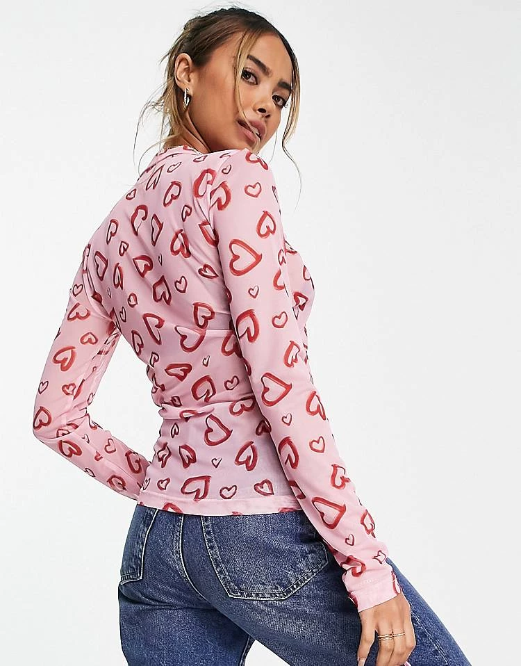 Urban Revivo Long Sleeve Top In Pink Heart Print For Women 4 Urban Revivo Long Sleeve Top In Pink Heart Print For Women - Image 2