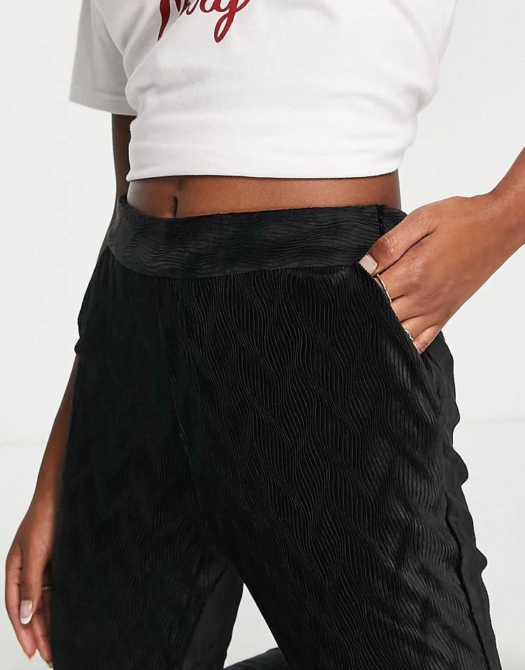 Urban Revivo Textured Flare Trousers In Black For Women 5 Urban Revivo Textured Flare Trousers In Black For Women - Image 3